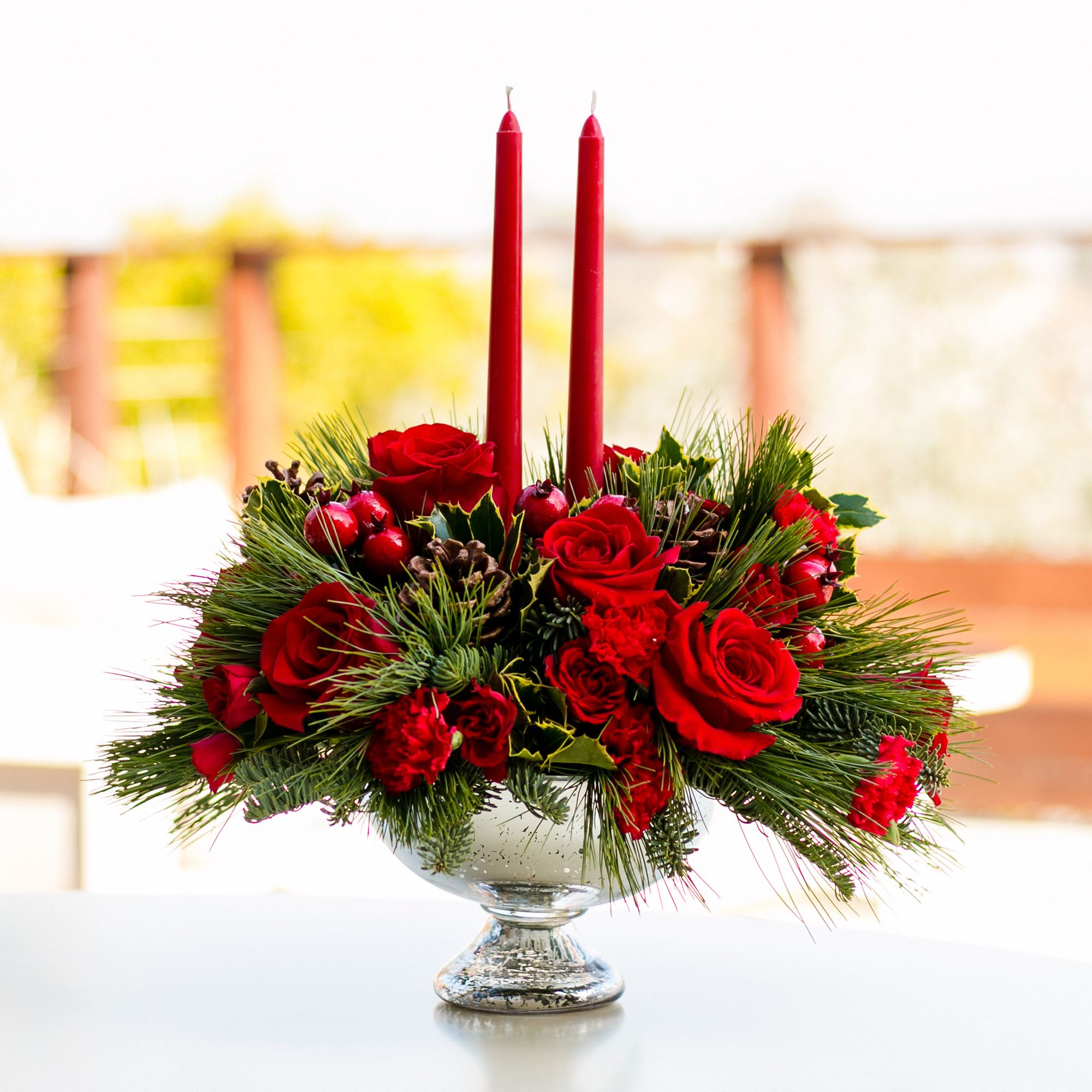 Teleflora's Mercury Glass Bowl Christmas Bouquet with candles