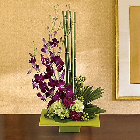 Zen Artistry - striking bouquet surprises with delicate purple orchids, mini bamboo and a colorful mix of blooms - sure to improve any room's feng shui.